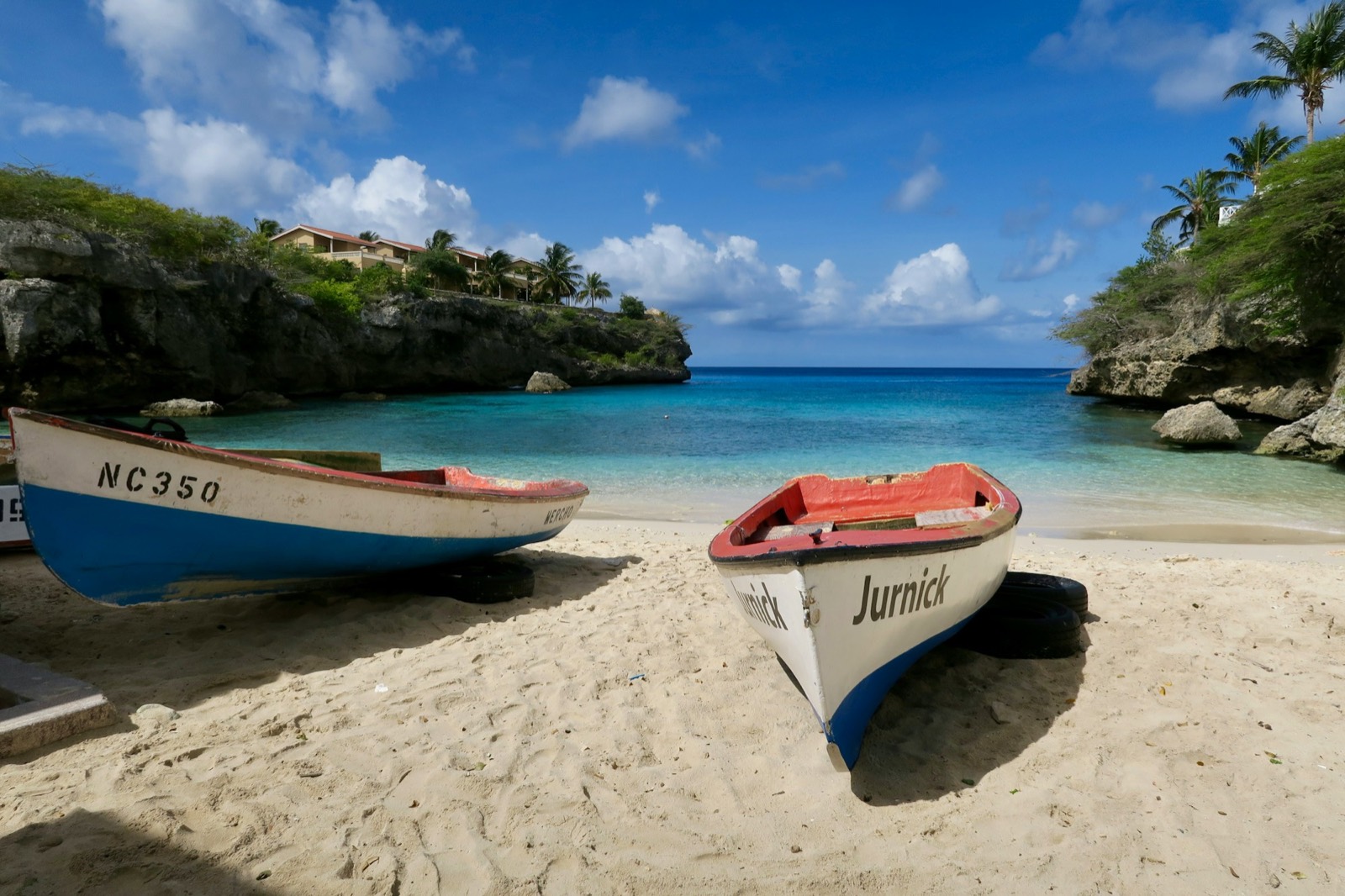Traditional fishing boats on the sand at Playa Lagun, Curaçao